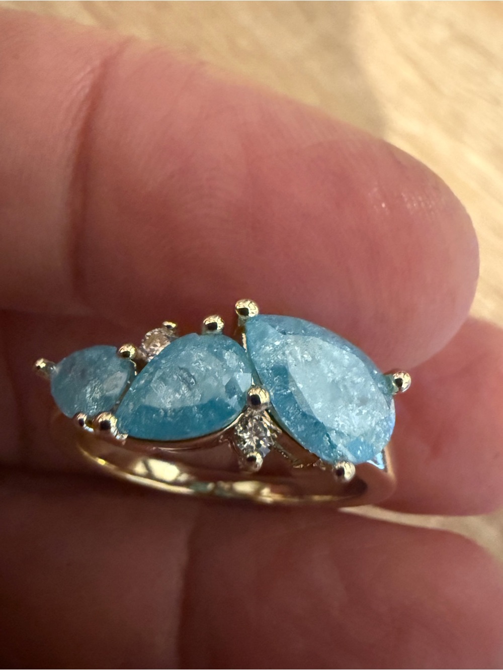 Gold Ring with Sky Blue Teardrop Gemstones and Accent Diamonds
